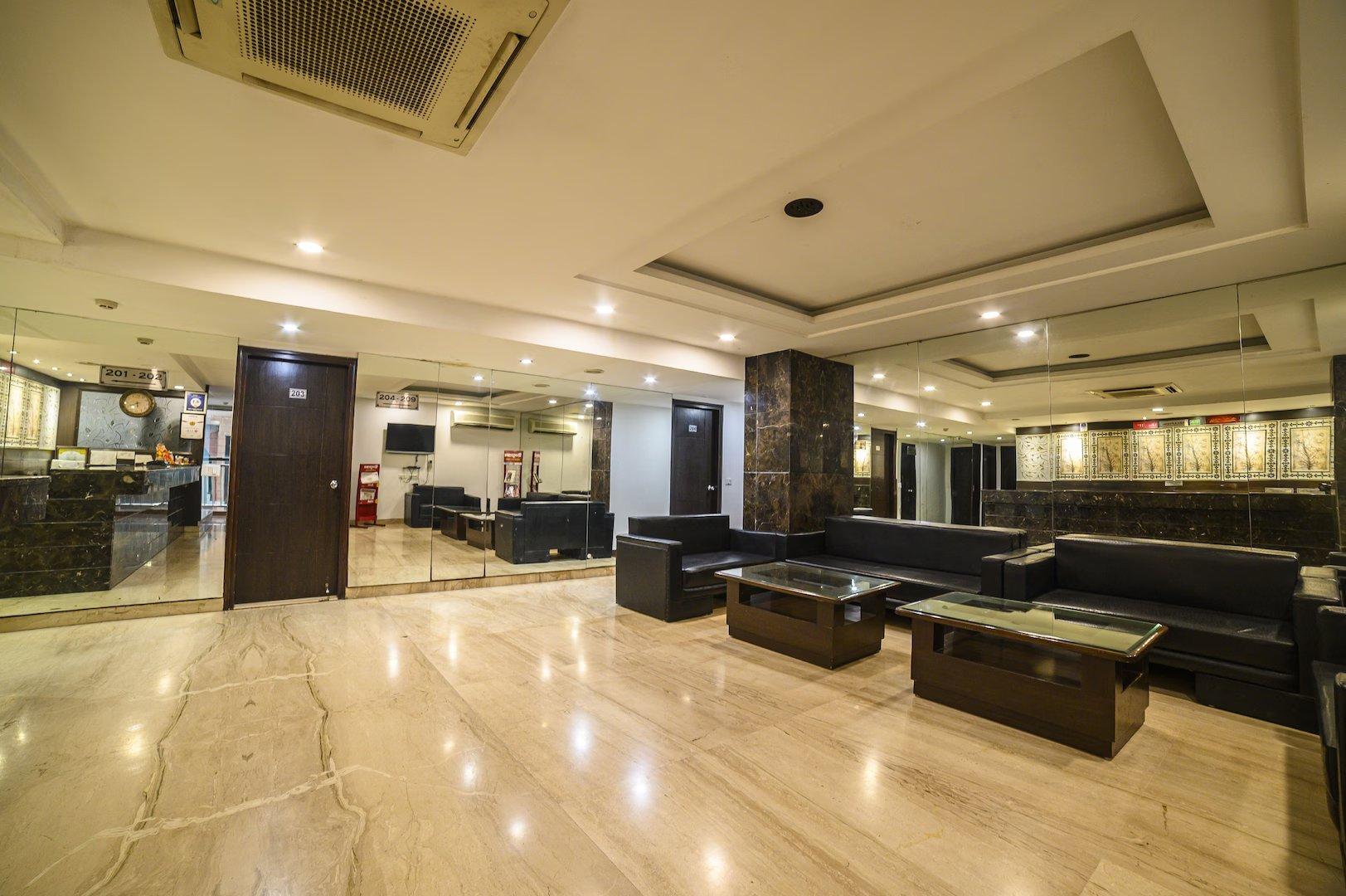 seating area with chair at hotel blue sapphire in agra
