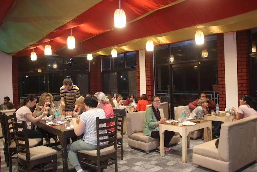 Hotel Holiday Hill dining area at Hotel holiday hill in Dharamshala